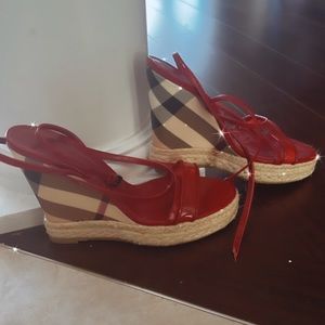 Gently used beautiful Burberry Wedge Sandles. Hardly worn.